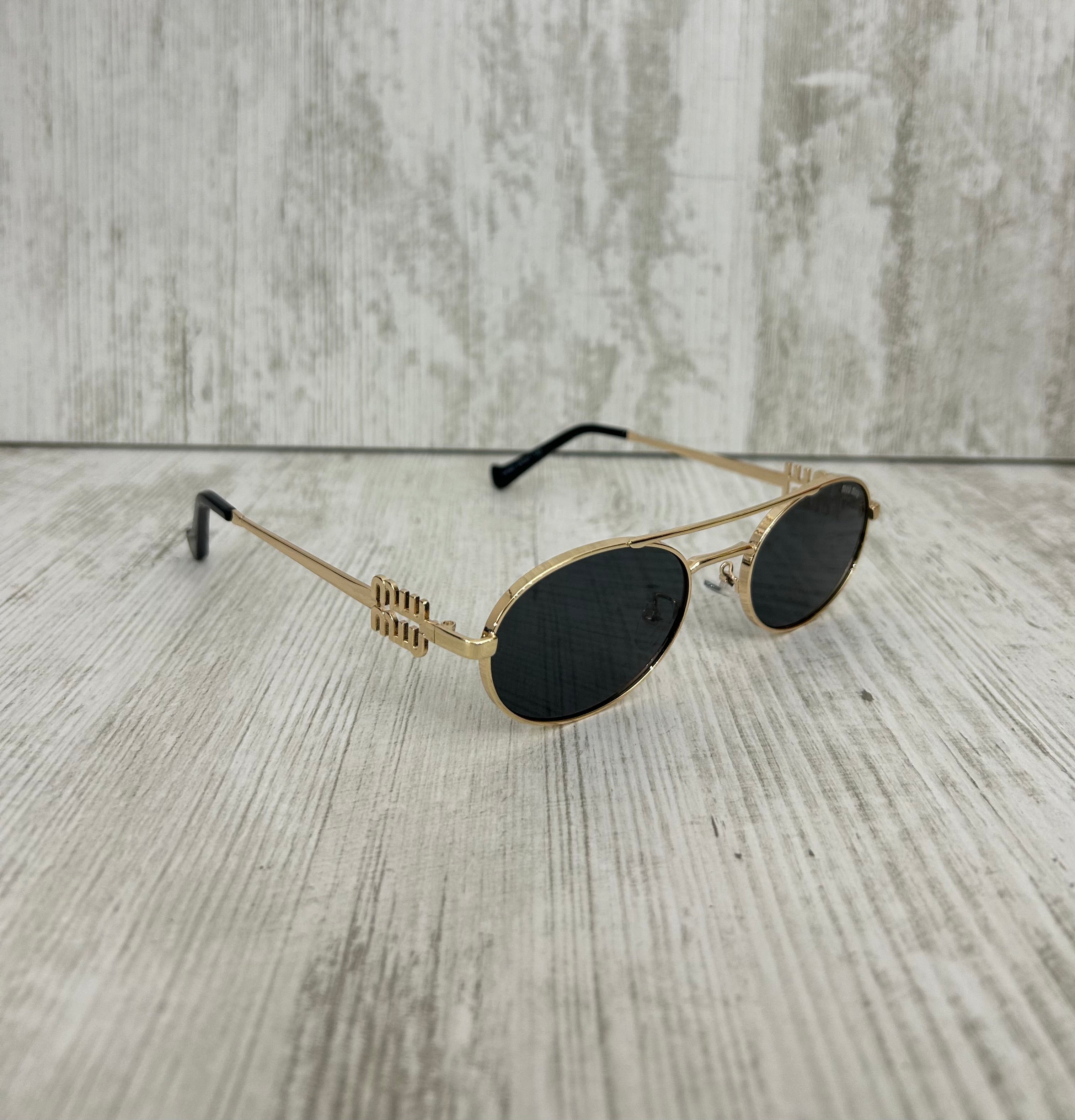 Miu Miu Glasses