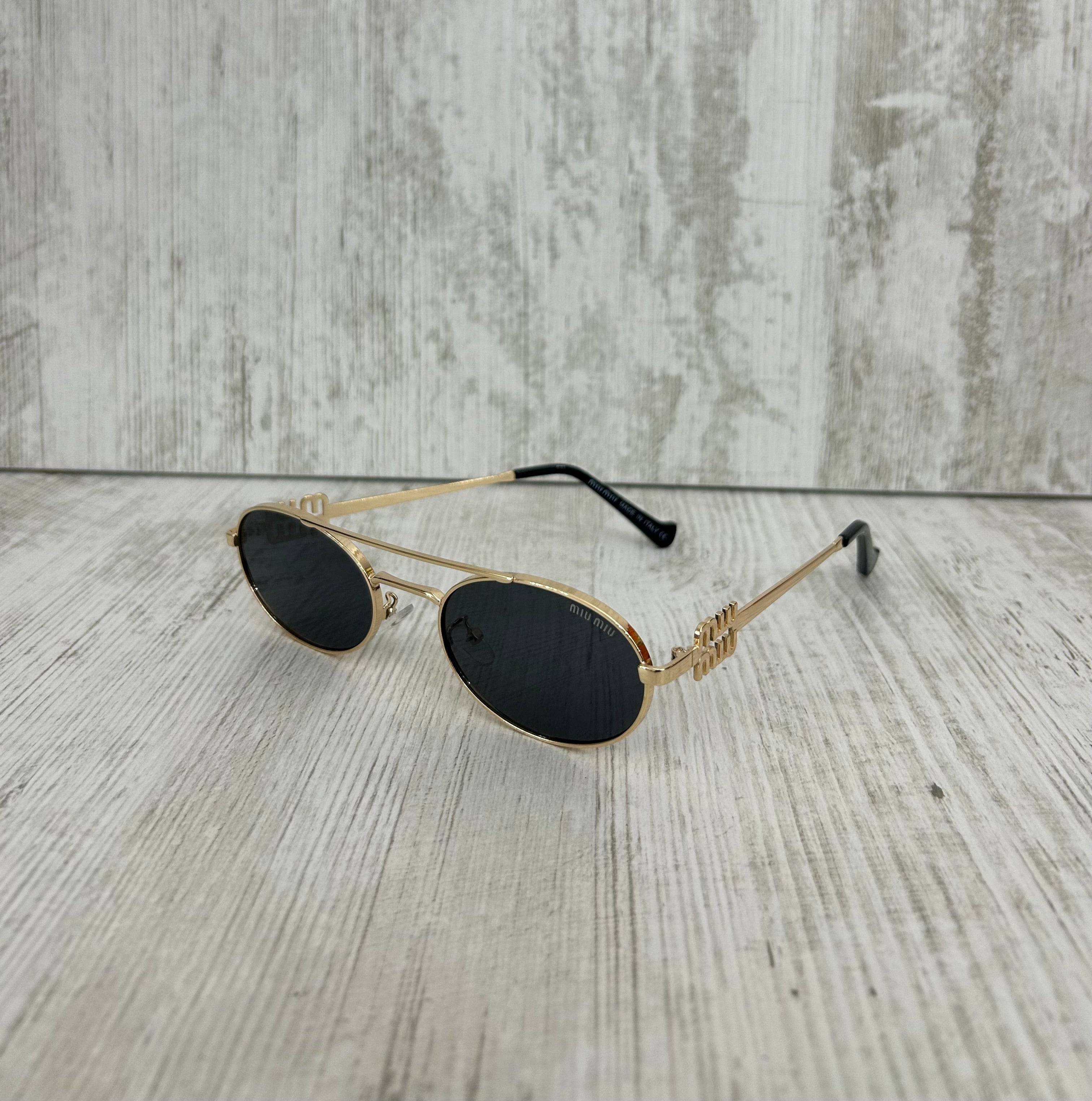 Miu Miu Glasses