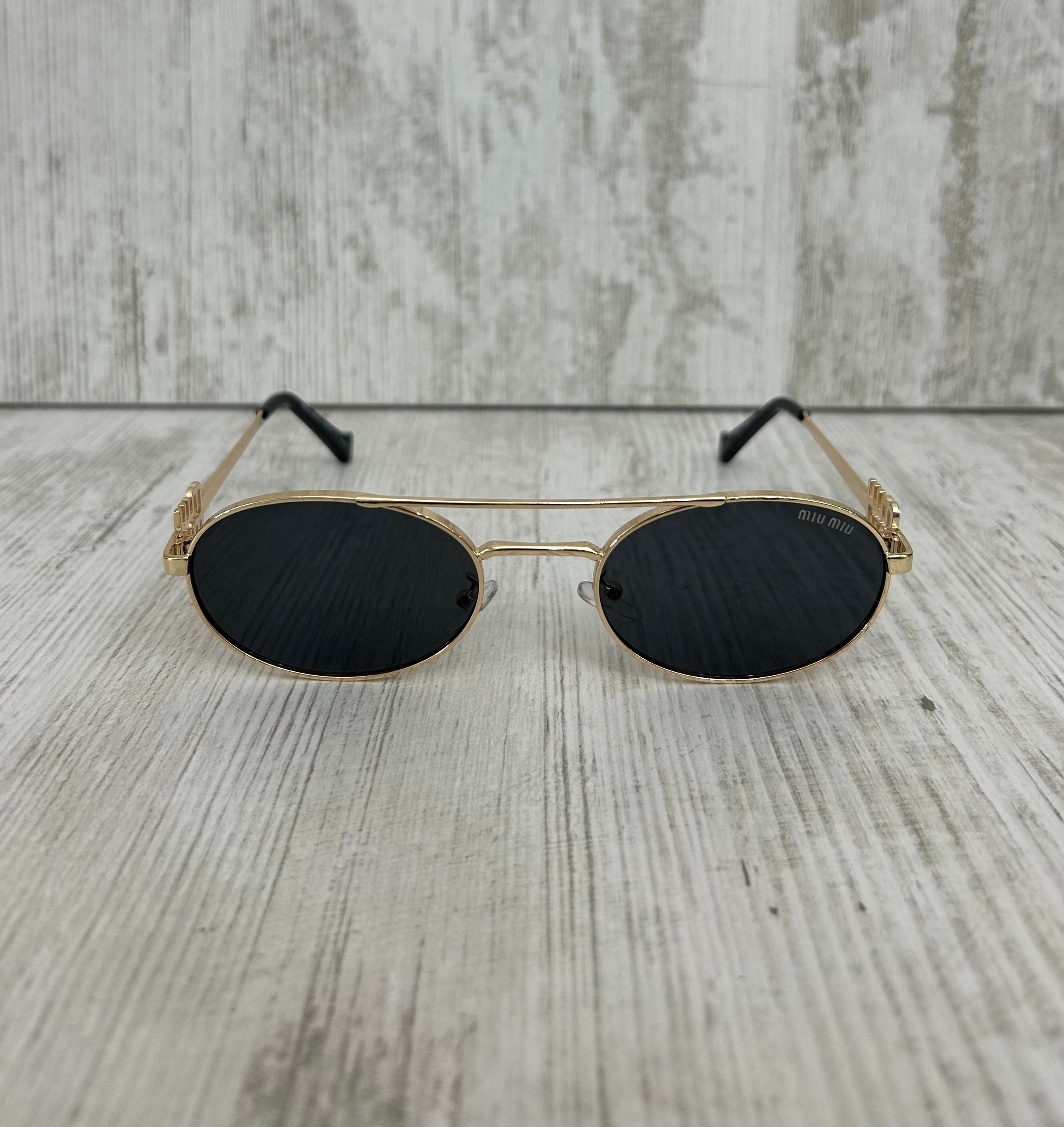Miu Miu Glasses